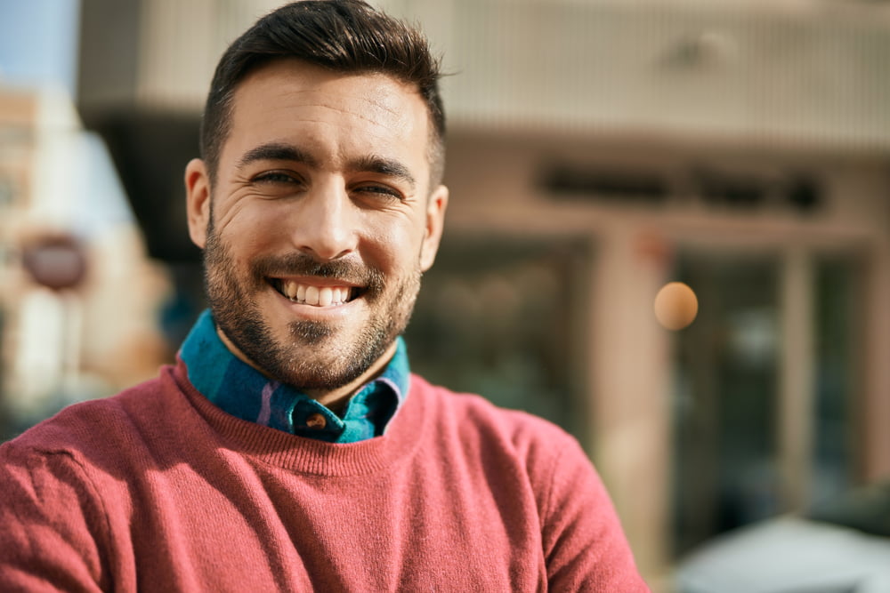 A happy man outdoors - Dental Emergency in St. George, UT A happy man outdoors - Dental Emergency in St. George, UT